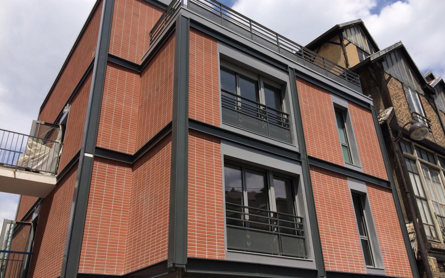 Les Orangers de Dantzig, construction neuve à Paris réalisée avec des menuiseries alu K-LINE. 