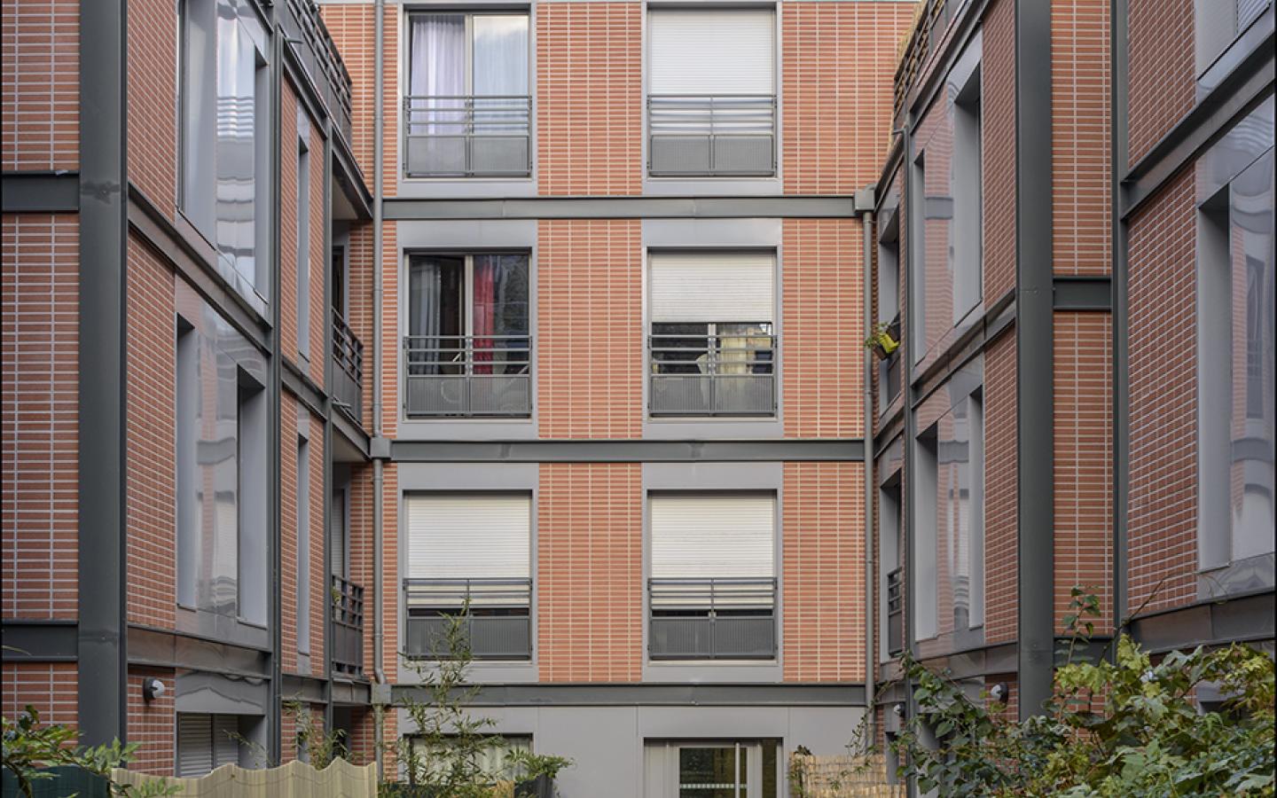 Les Orangers de Dantzig, construction neuve à Paris réalisée avec des menuiseries alu K-LINE. 