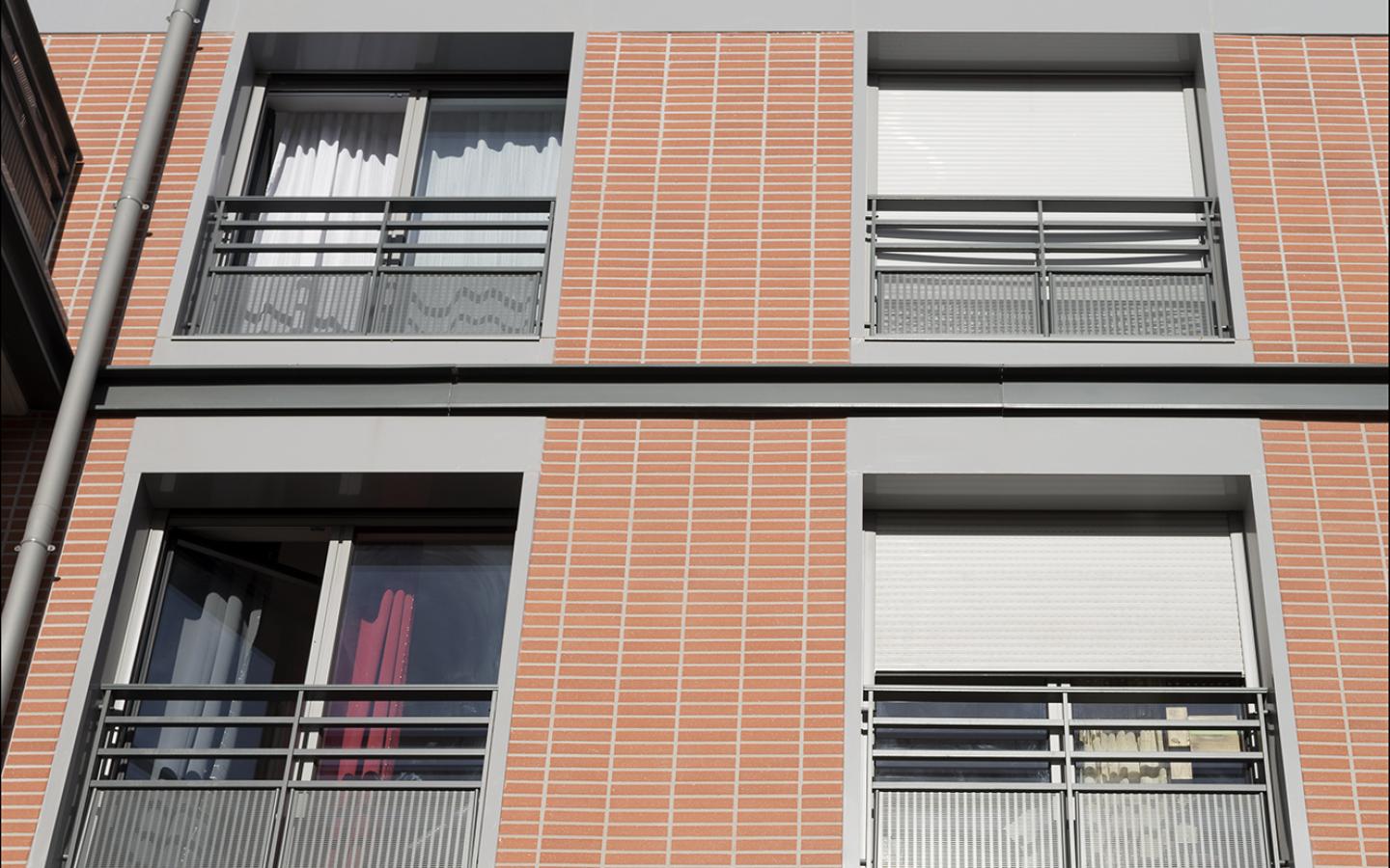 Les Orangers de Dantzig, construction neuve à Paris réalisée avec des menuiseries alu K-LINE. 