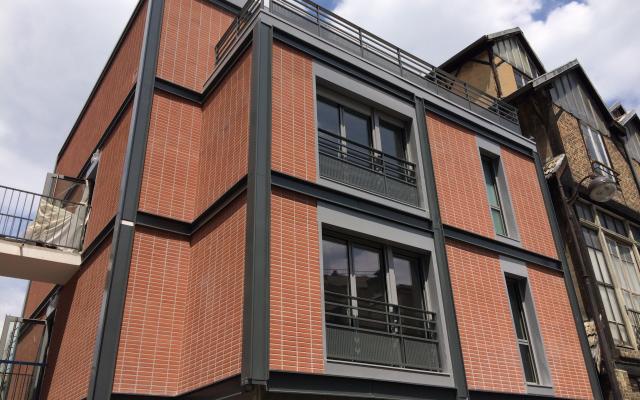 Les Orangers de Dantzig, construction neuve à Paris réalisée avec des menuiseries alu K-LINE. 