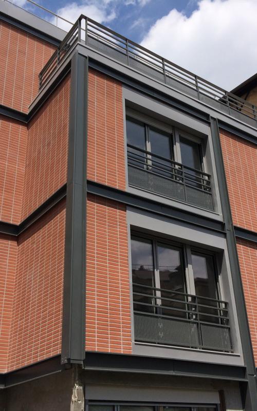 Les Orangers de Dantzig, construction neuve à Paris réalisée avec des menuiseries alu K-LINE. 